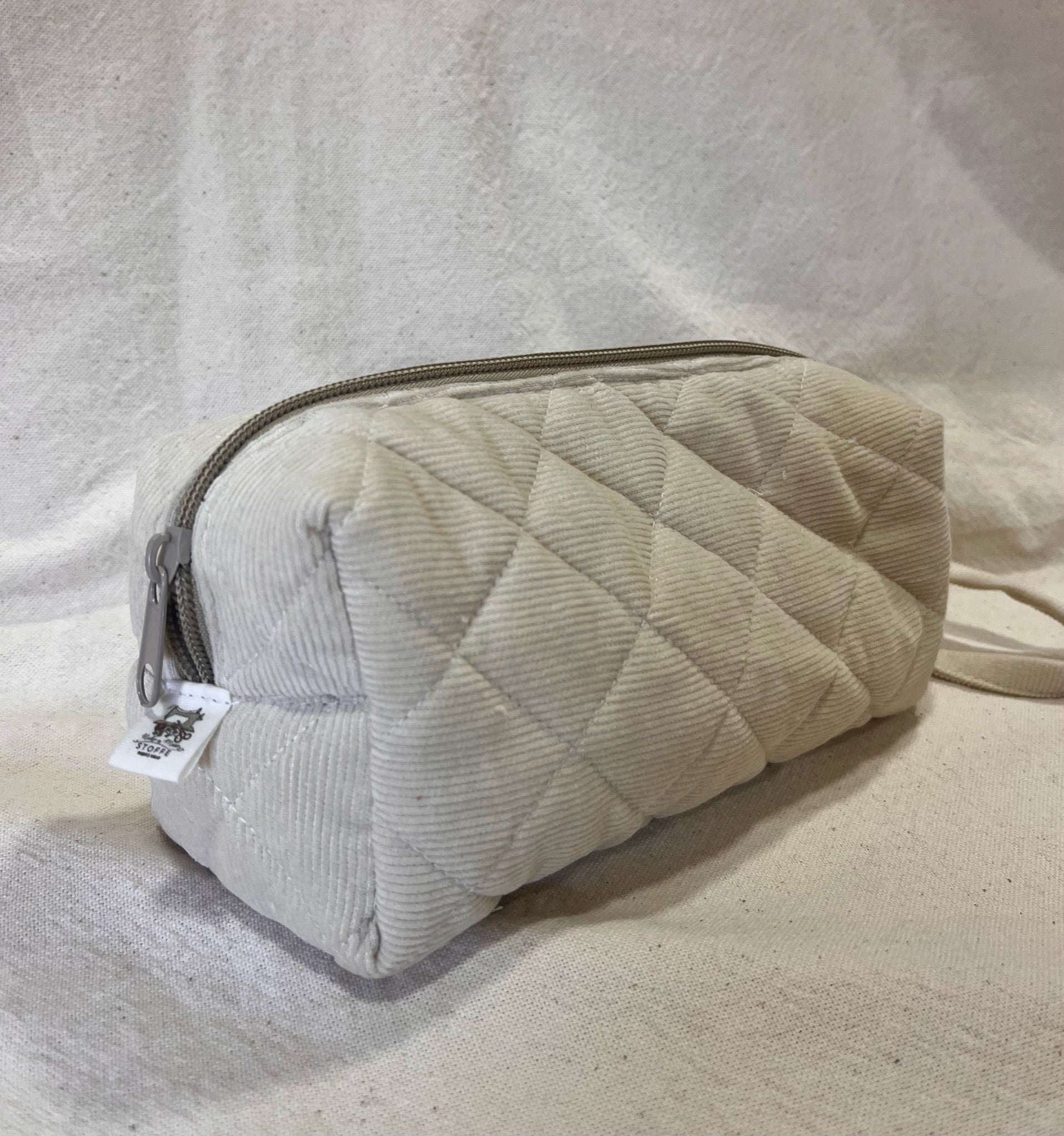 Estuche acolchado con cierre