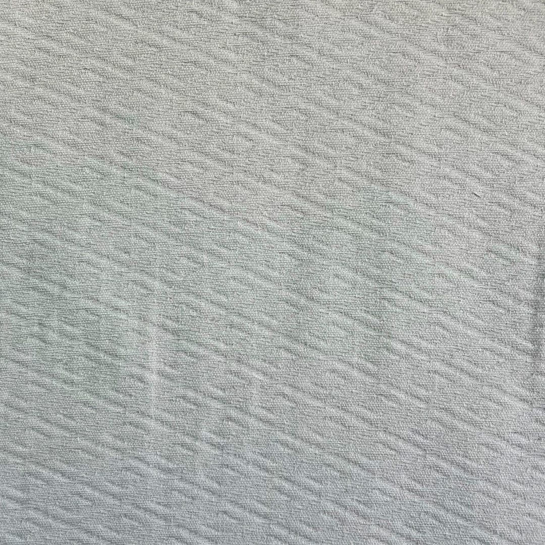 Piqué Rombo Blanco – Elegancia y suavidad